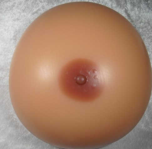 extremely-large-silicone-breasts-22lbs